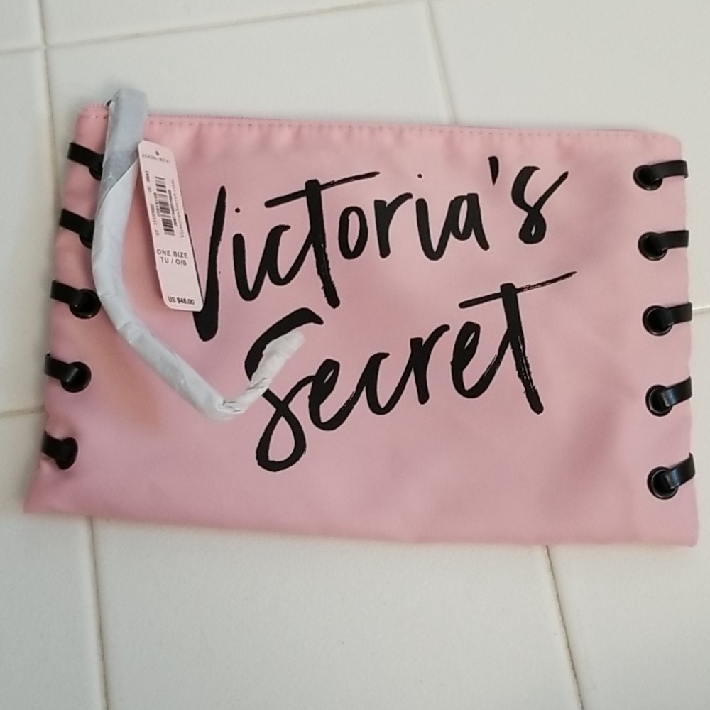 3 for $30. VS Swim suit or make up bag.